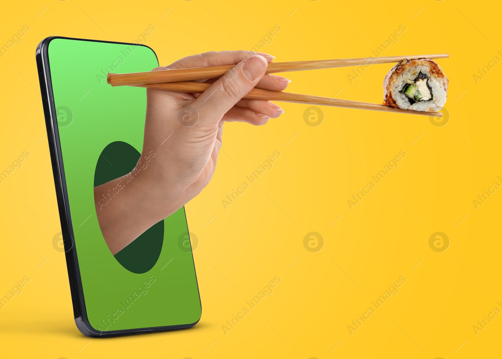 Image of Food ordering and delivery service. Woman's hand with sushi roll, sticking out of mobile phone display against orange background, closeup