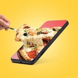 Image of Food ordering and delivery service. Woman taking slice of tasty pizza from mobile phone display against orange background, closeup