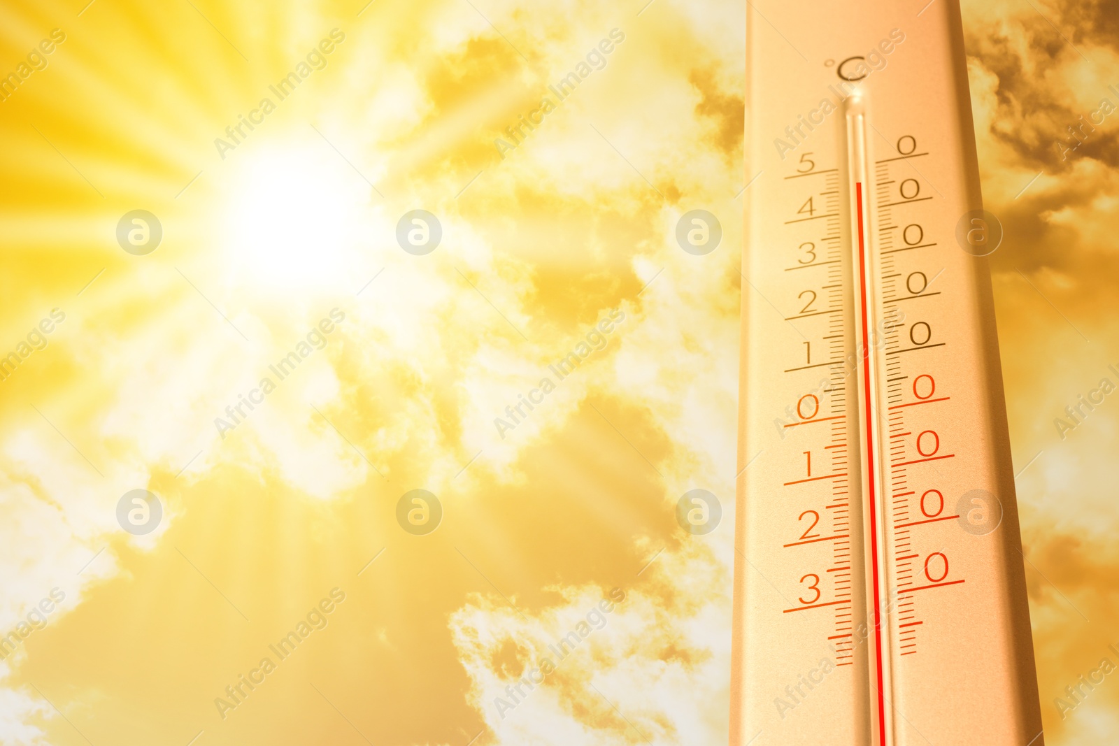 Extremely high temperature on thermometer against orange sky on sunny day. Severely hot summer weather Image of Extremely high temperature on thermometer against orange sky on sunny day. Severely hot summer weather