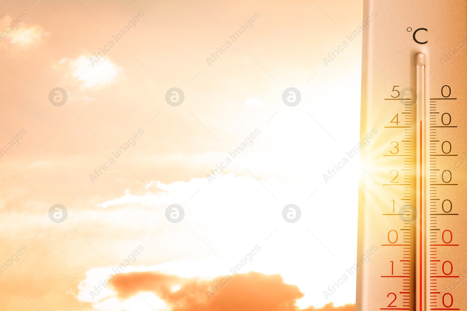 High temperature on thermometer against orange sky on sunny day. Hot summer weather Image of High temperature on thermometer against orange sky on sunny day. Hot summer weather