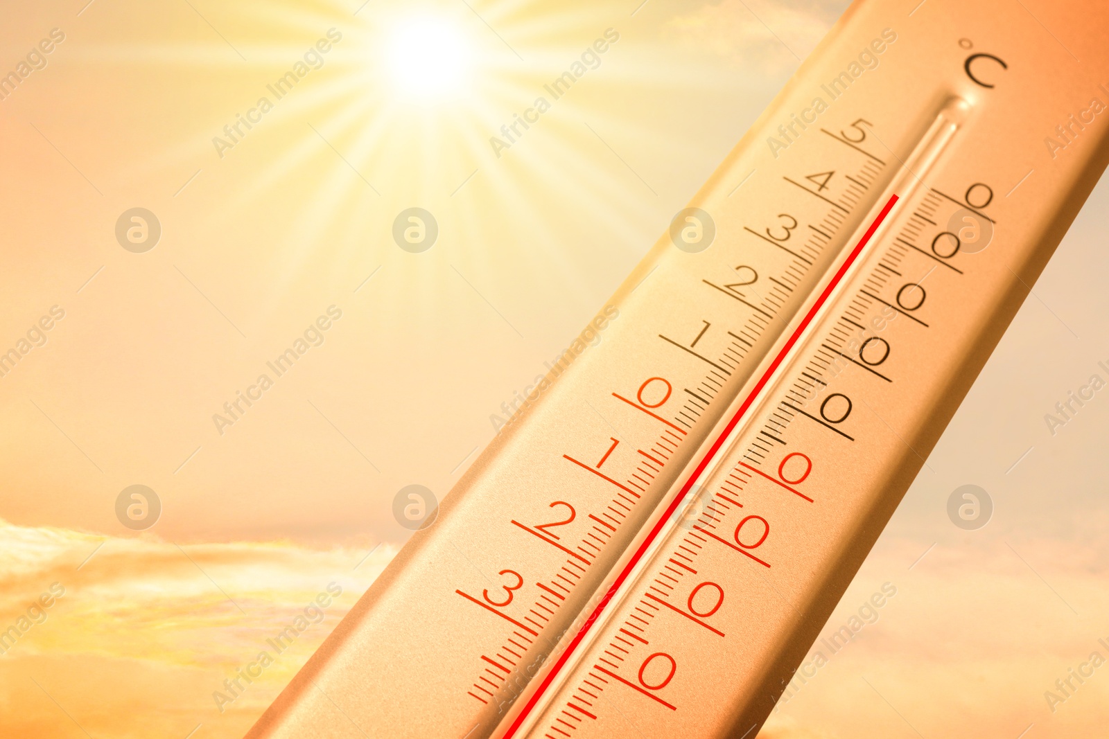 Extremely high temperature on thermometer against orange sky on sunny day. Severely hot summer weather Image of Extremely high temperature on thermometer against orange sky on sunny day. Severely hot summer weather