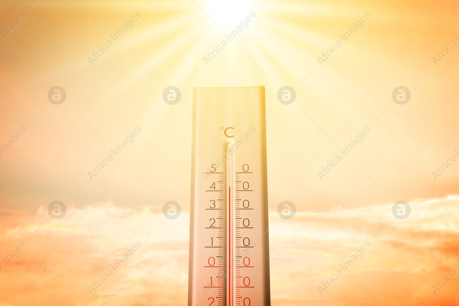 High temperature on thermometer against orange sky on sunny day. Hot summer weather Image of High temperature on thermometer against orange sky on sunny day. Hot summer weather