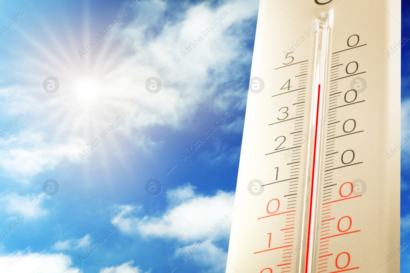 High temperature on thermometer against blue sky on sunny day. Summer weather Image of High temperature on thermometer against blue sky on sunny day. Summer weather