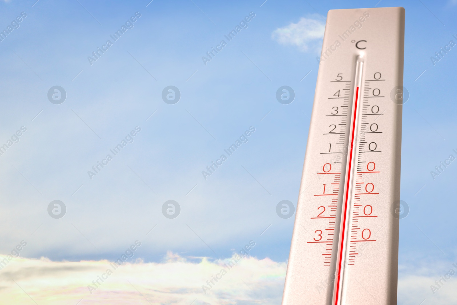 Extremely high temperature on thermometer against blue sky on sunny day. Summer weather Image of Extremely high temperature on thermometer against blue sky on sunny day. Summer weather