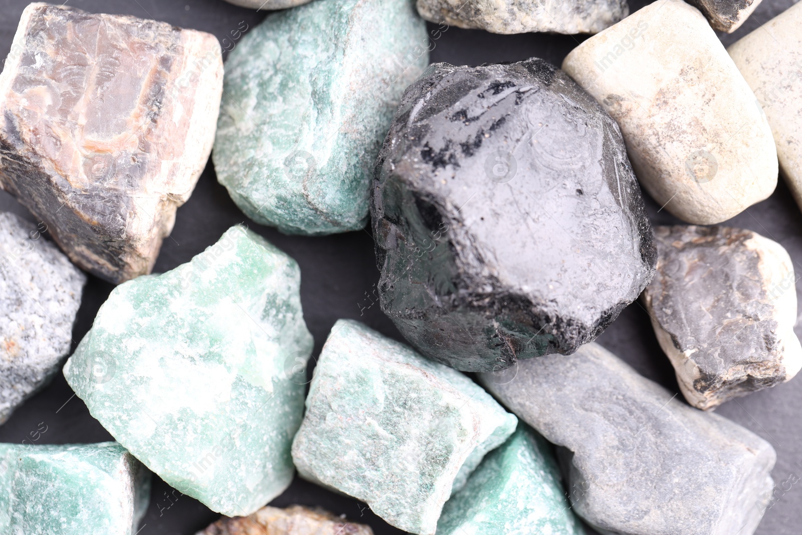 Different healing stones on table, top view Photo of Different healing stones on table, top view