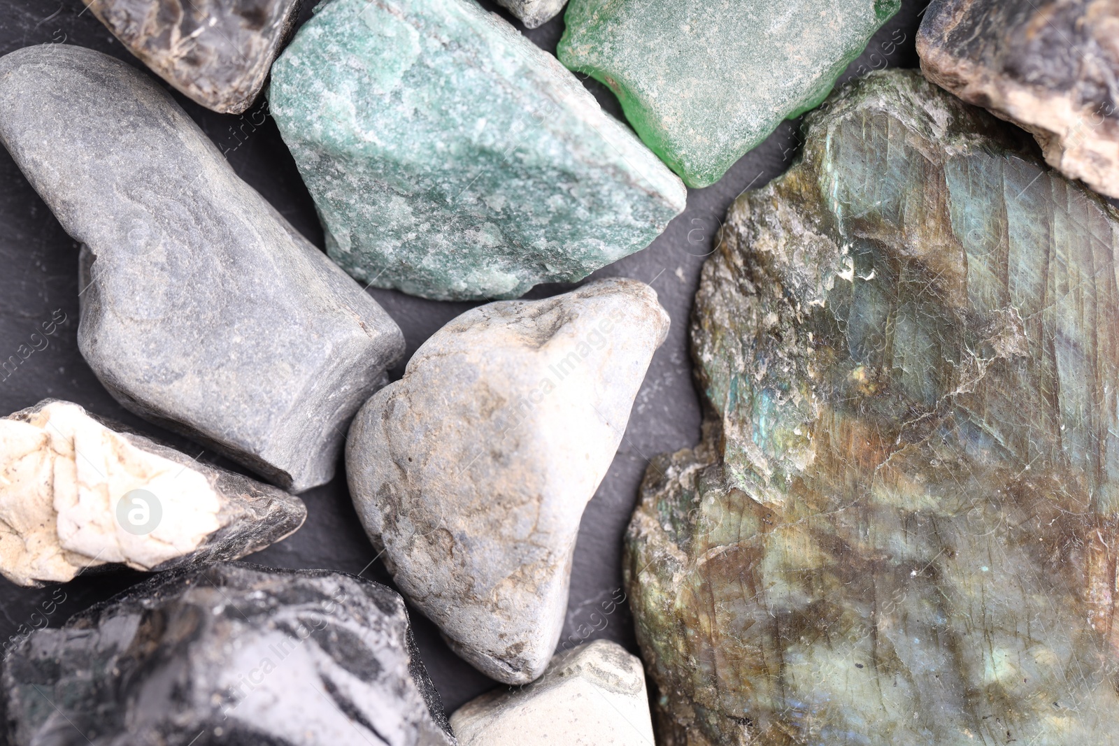 Different healing stones on table, top view Photo of Different healing stones on table, top view