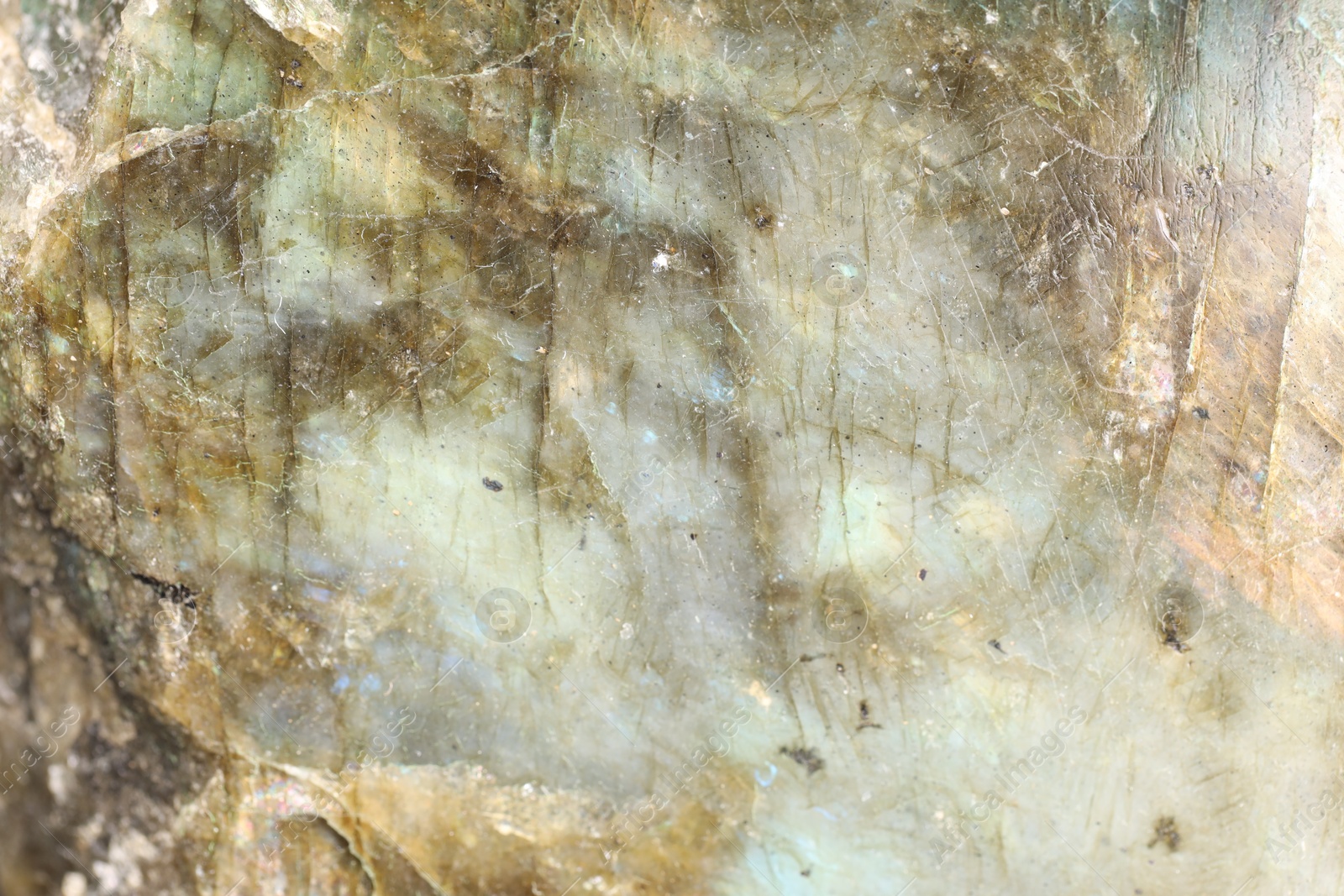 Healing stone. Beautiful labradorite as background, top view Photo of Healing stone. Beautiful labradorite as background, top view