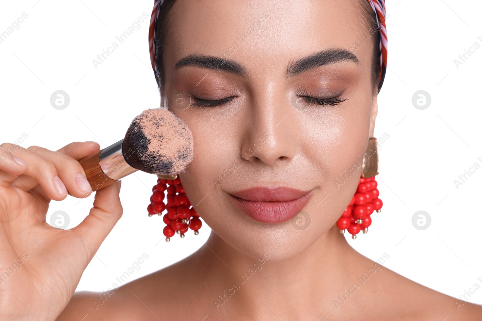Beautiful woman with makeup brush on white background Photo of Beautiful woman with makeup brush on white background