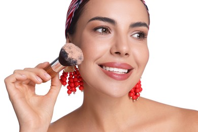 Photo of Beautiful woman with makeup brush on white background, closeup