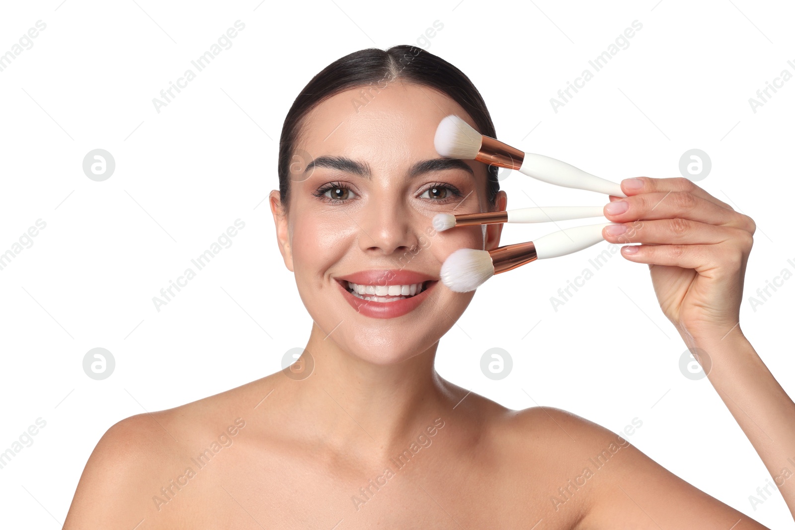 Beautiful woman with makeup brushes on white background Photo of Beautiful woman with makeup brushes on white background