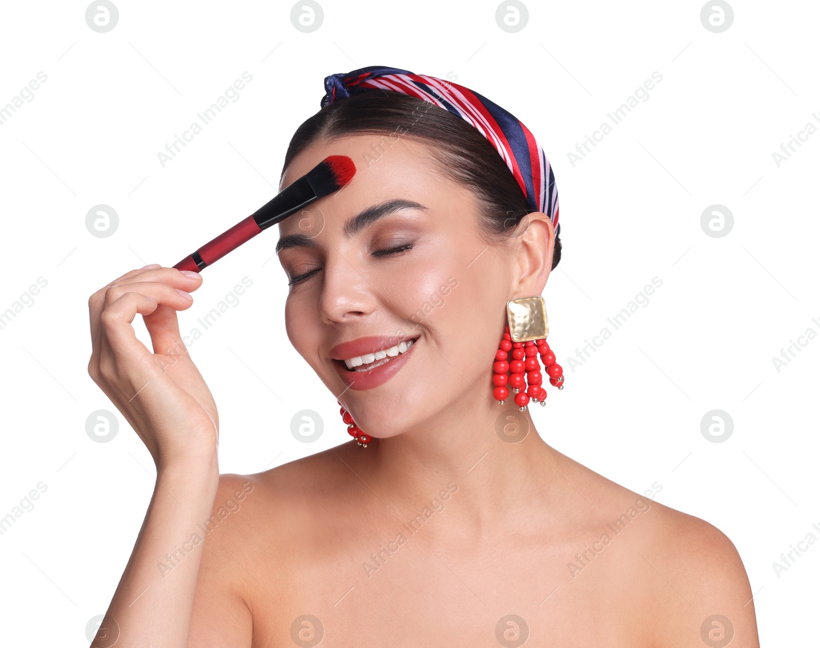 Photo of Beautiful woman applying makeup with brush on white background