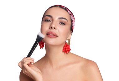 Photo of Beautiful woman with makeup brush on white background