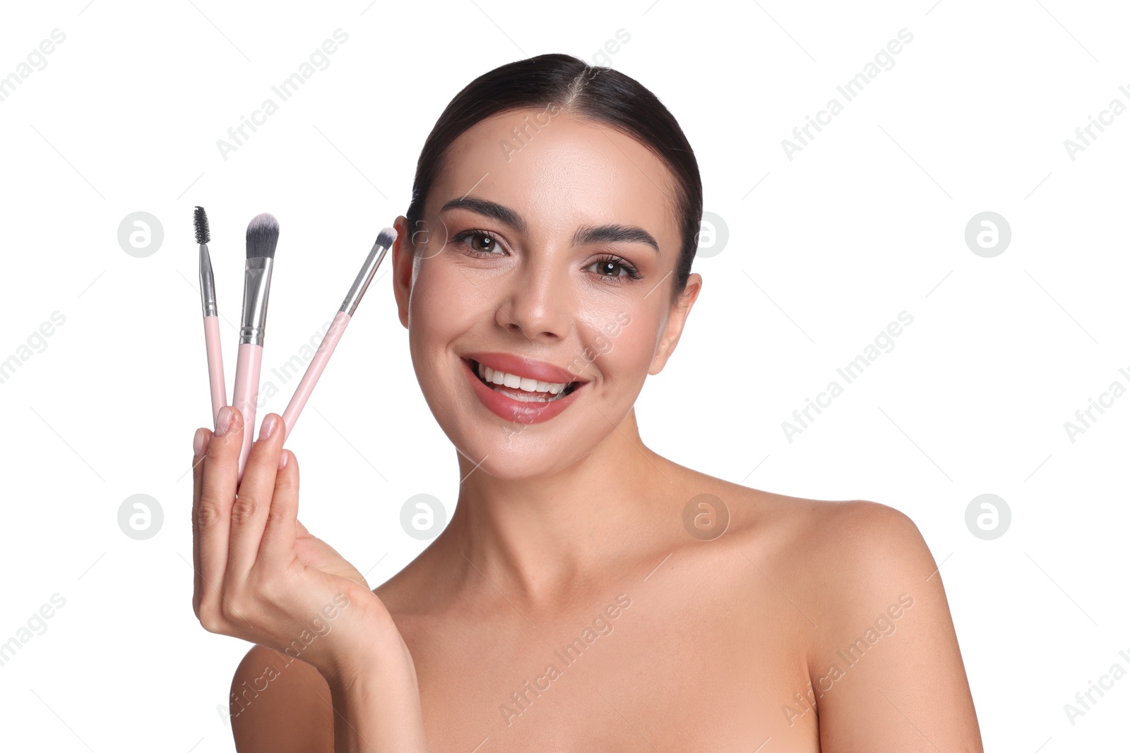 Beautiful woman with makeup brushes on white background Photo of Beautiful woman with makeup brushes on white background