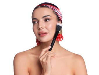 Photo of Beautiful woman with makeup brush on white background