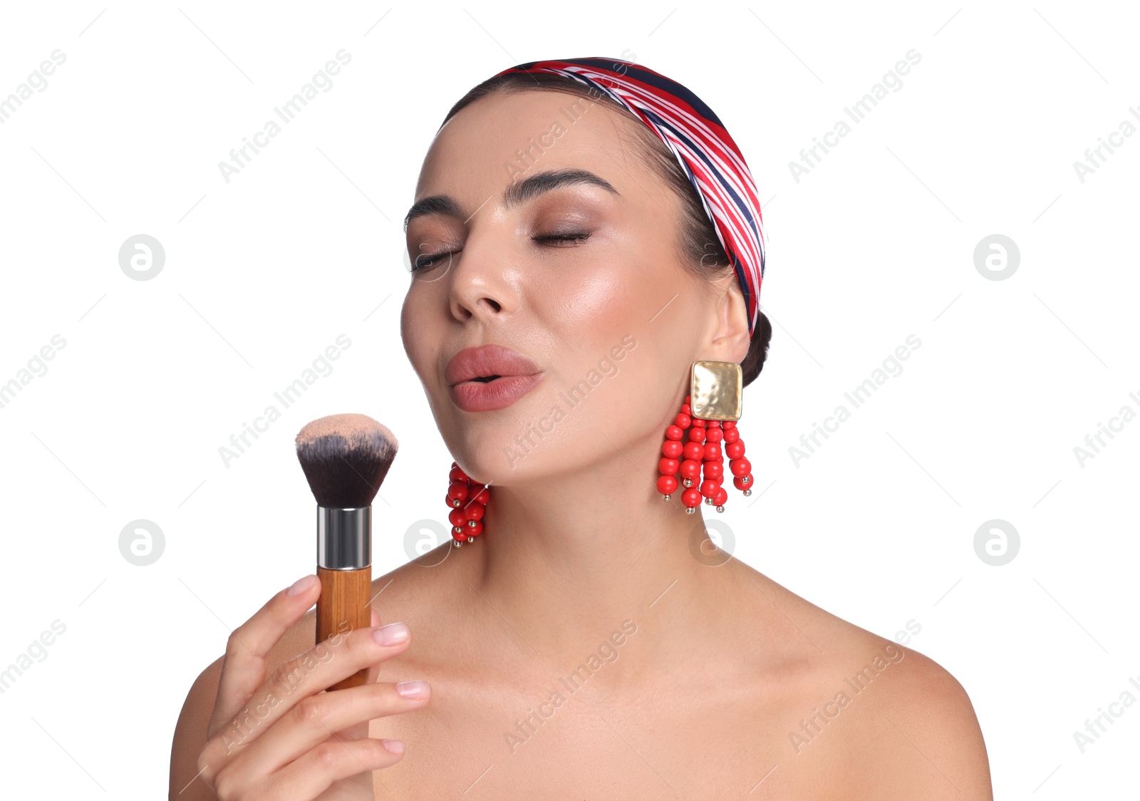 Beautiful woman with makeup brush on white background Photo of Beautiful woman with makeup brush on white background
