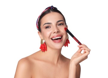 Photo of Beautiful woman applying makeup with brush on white background