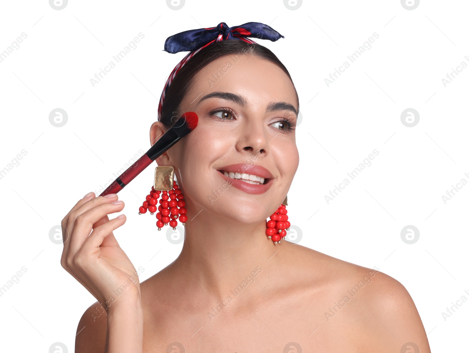 Beautiful woman applying makeup with brush on white background Photo of Beautiful woman applying makeup with brush on white background