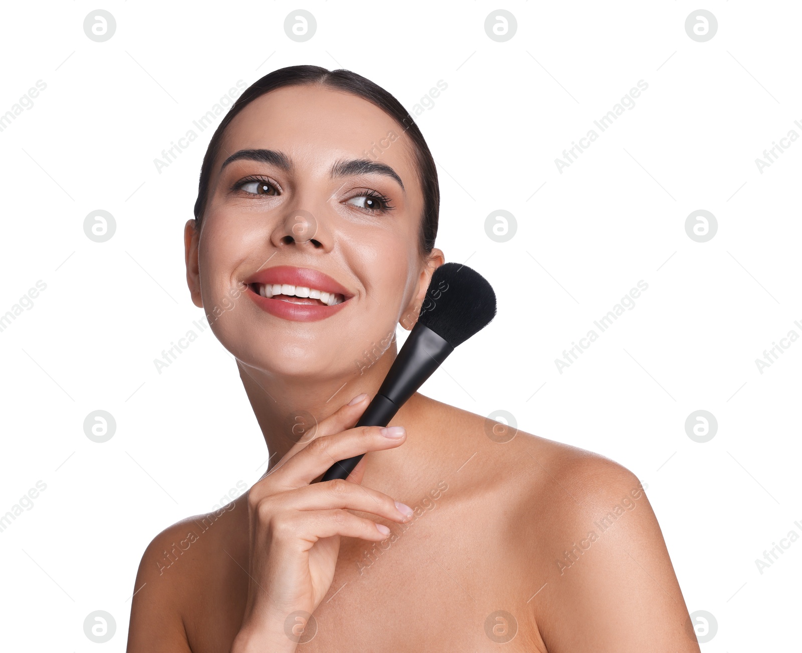 Beautiful woman with makeup brush on white background Photo of Beautiful woman with makeup brush on white background