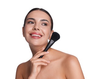 Photo of Beautiful woman with makeup brush on white background