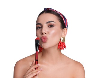 Photo of Beautiful woman with makeup brush on white background