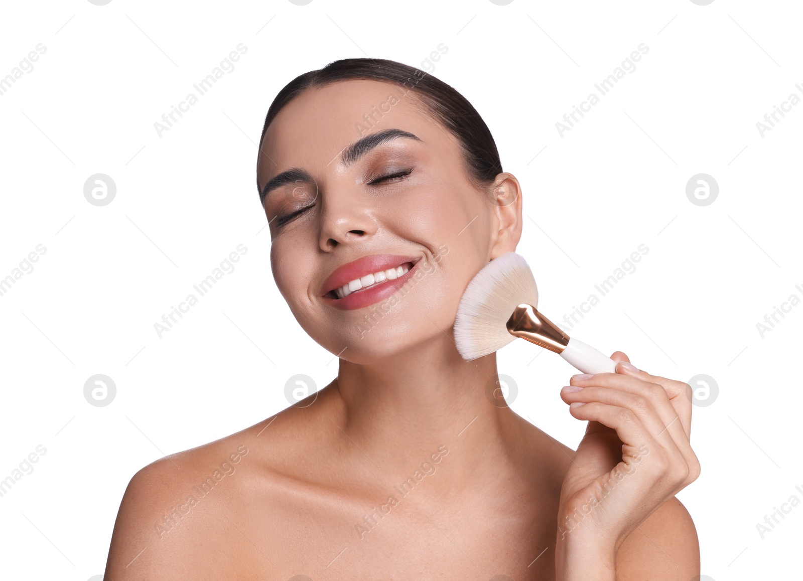 Photo of Beautiful woman applying makeup with brush on white background