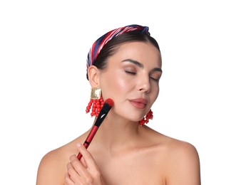 Photo of Beautiful woman applying makeup with brush on white background
