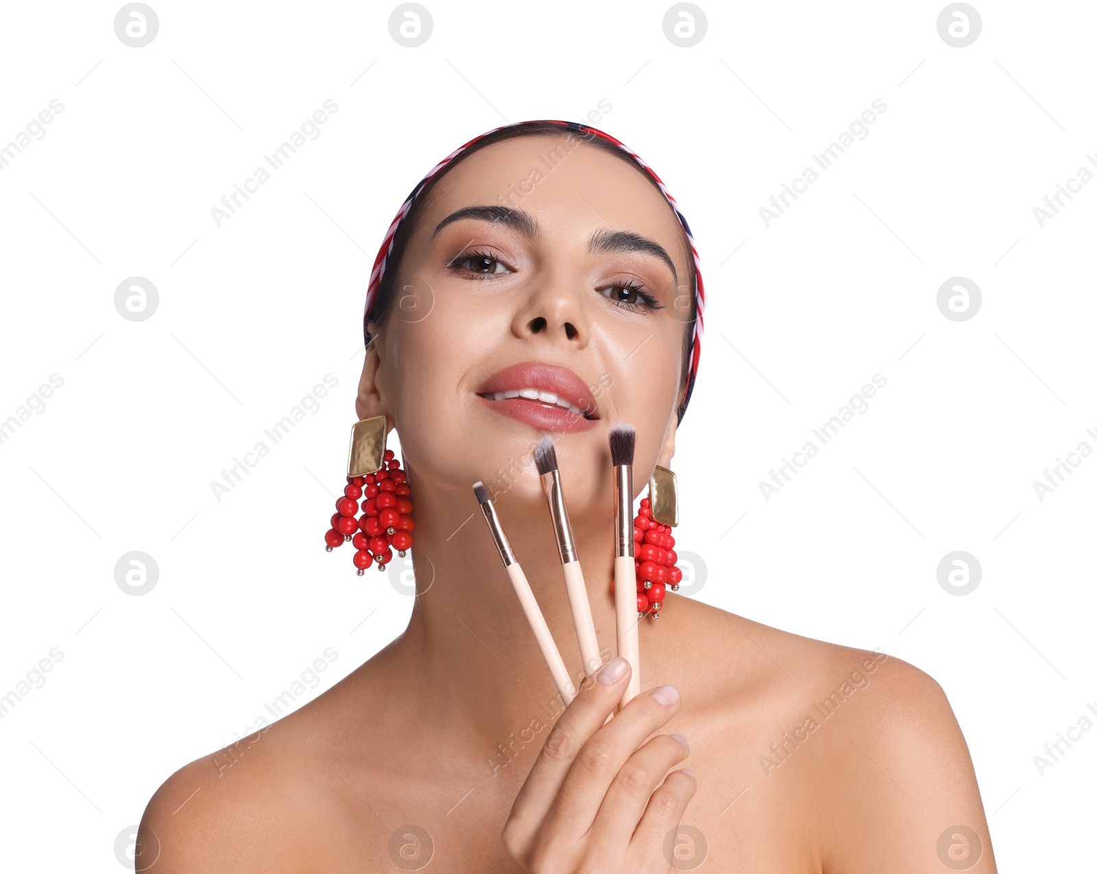 Beautiful woman with makeup brushes on white background Photo of Beautiful woman with makeup brushes on white background