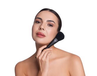 Photo of Beautiful woman with makeup brush on white background