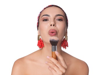 Photo of Beautiful woman with makeup brush on white background
