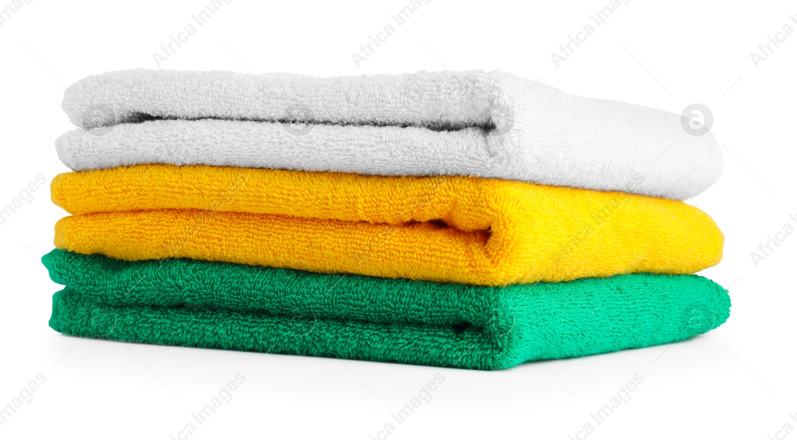 Photo of Stack of colorful terry towels isolated on white