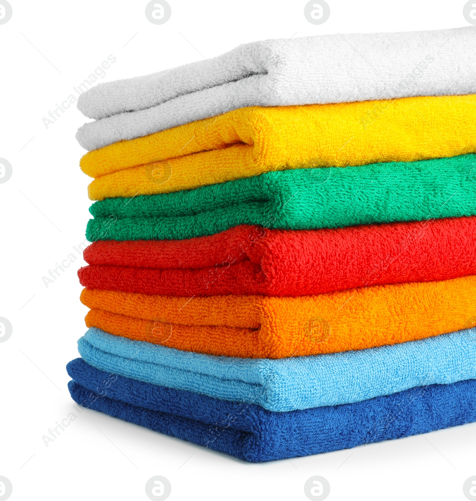 Photo of Stack of colorful terry towels isolated on white