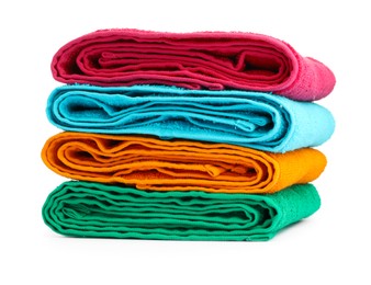 Photo of Stack of colorful terry towels isolated on white