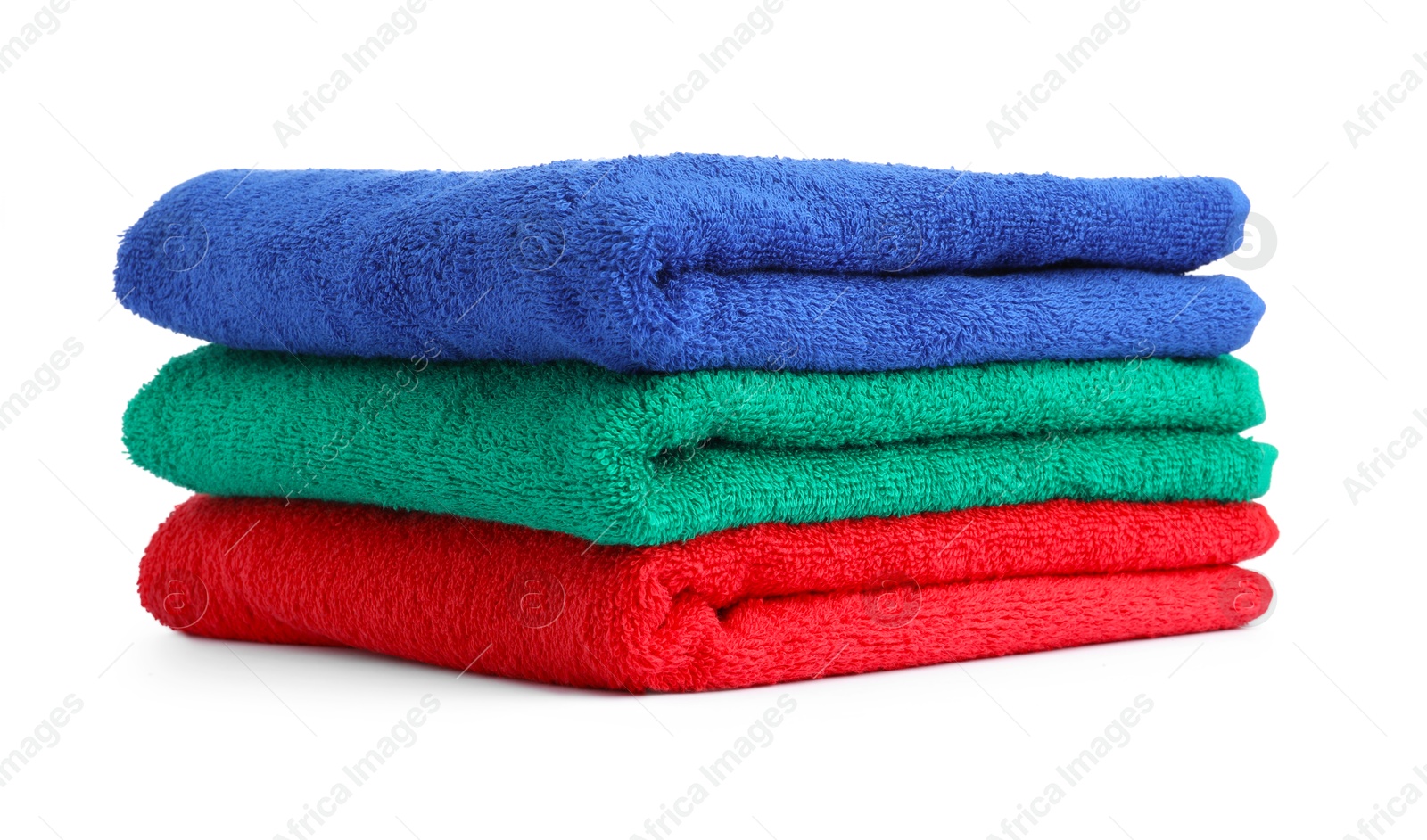 Photo of Stack of colorful terry towels isolated on white