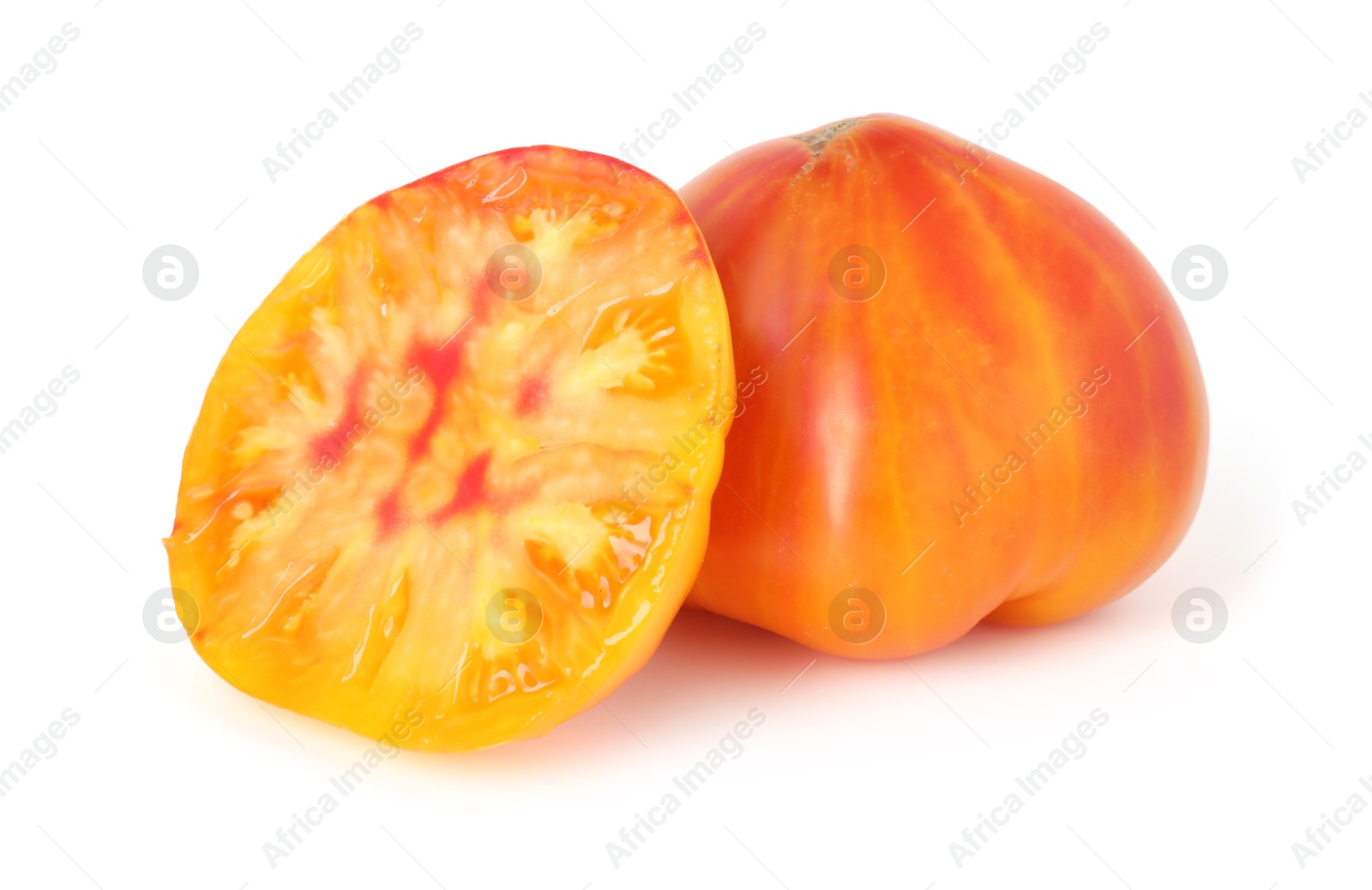 Photo of Whole and cut ripe tomatoes isolated on white