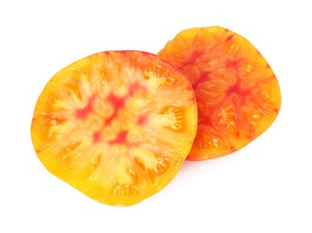 Photo of Pieces of ripe tomato isolated on white