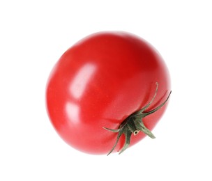 Photo of One ripe red tomato isolated on white