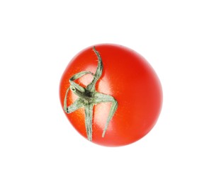 Photo of One ripe red tomato isolated on white