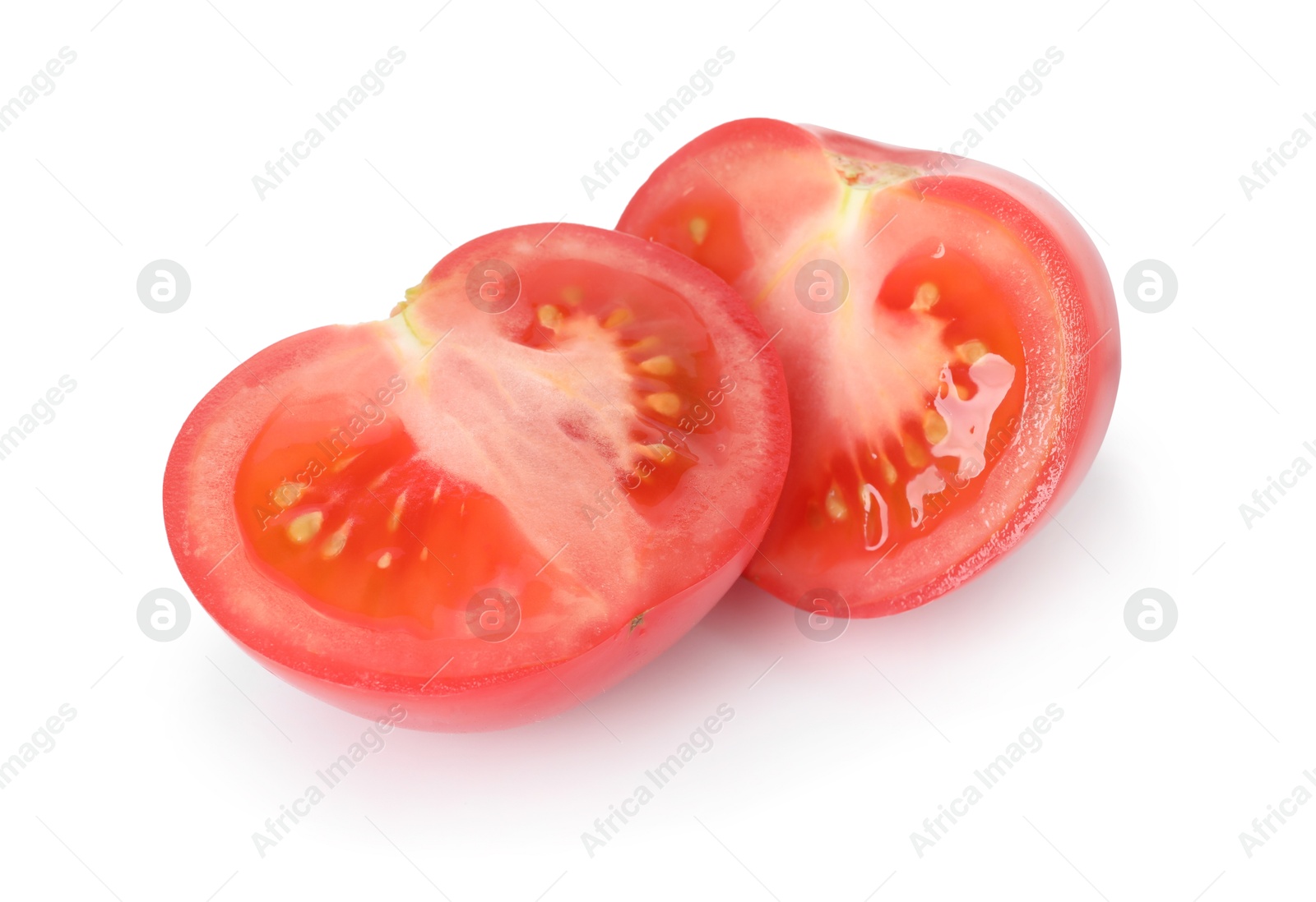 Pieces of ripe red tomato isolated on white Photo of Pieces of ripe red tomato isolated on white