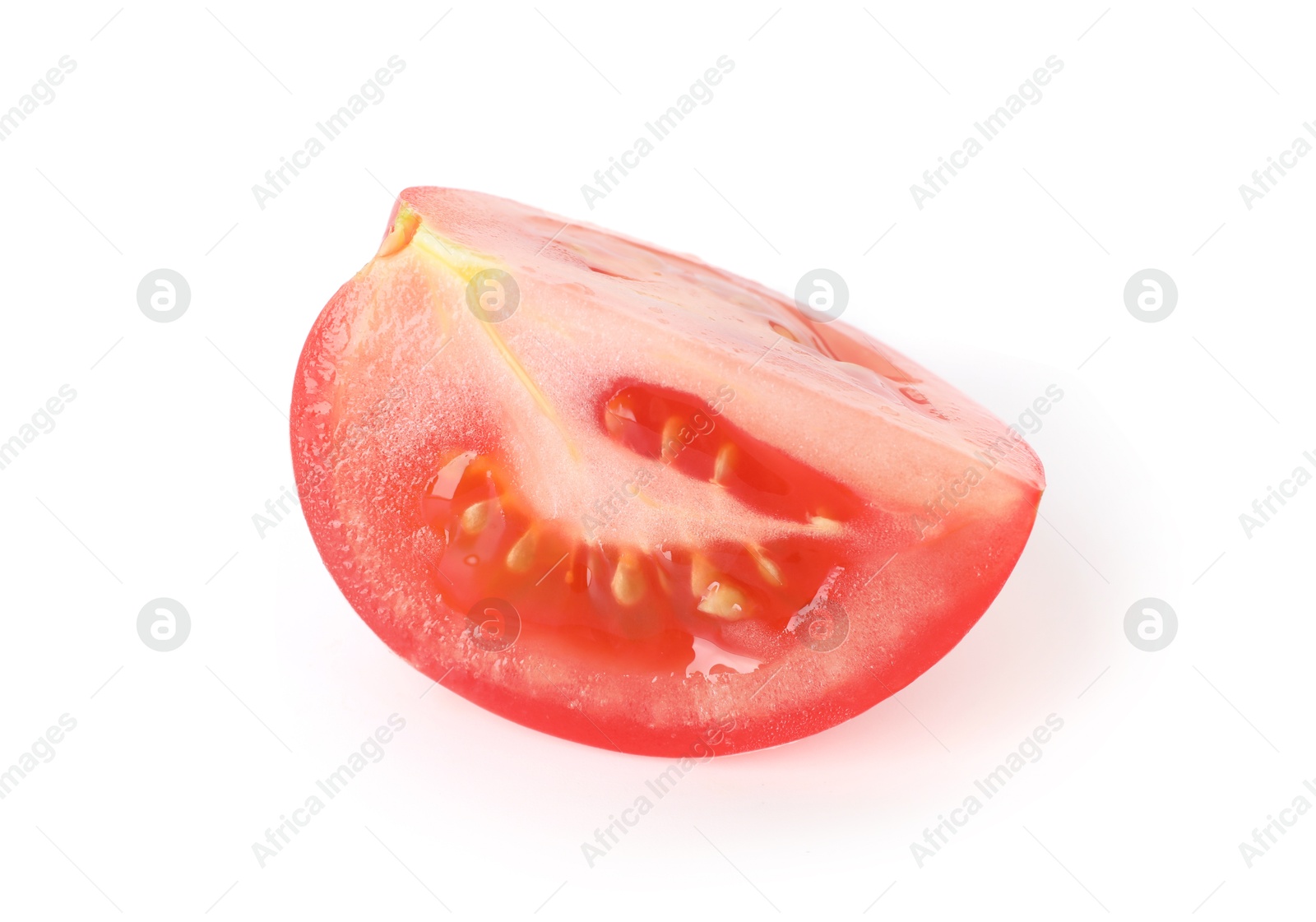 Piece of ripe red tomato isolated on white Photo of Piece of ripe red tomato isolated on white