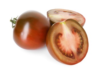 Photo of Pieces of ripe tomato isolated on white