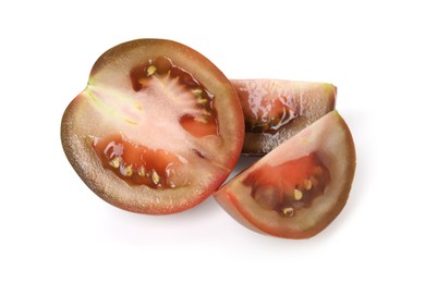 Photo of Pieces of ripe tomato isolated on white