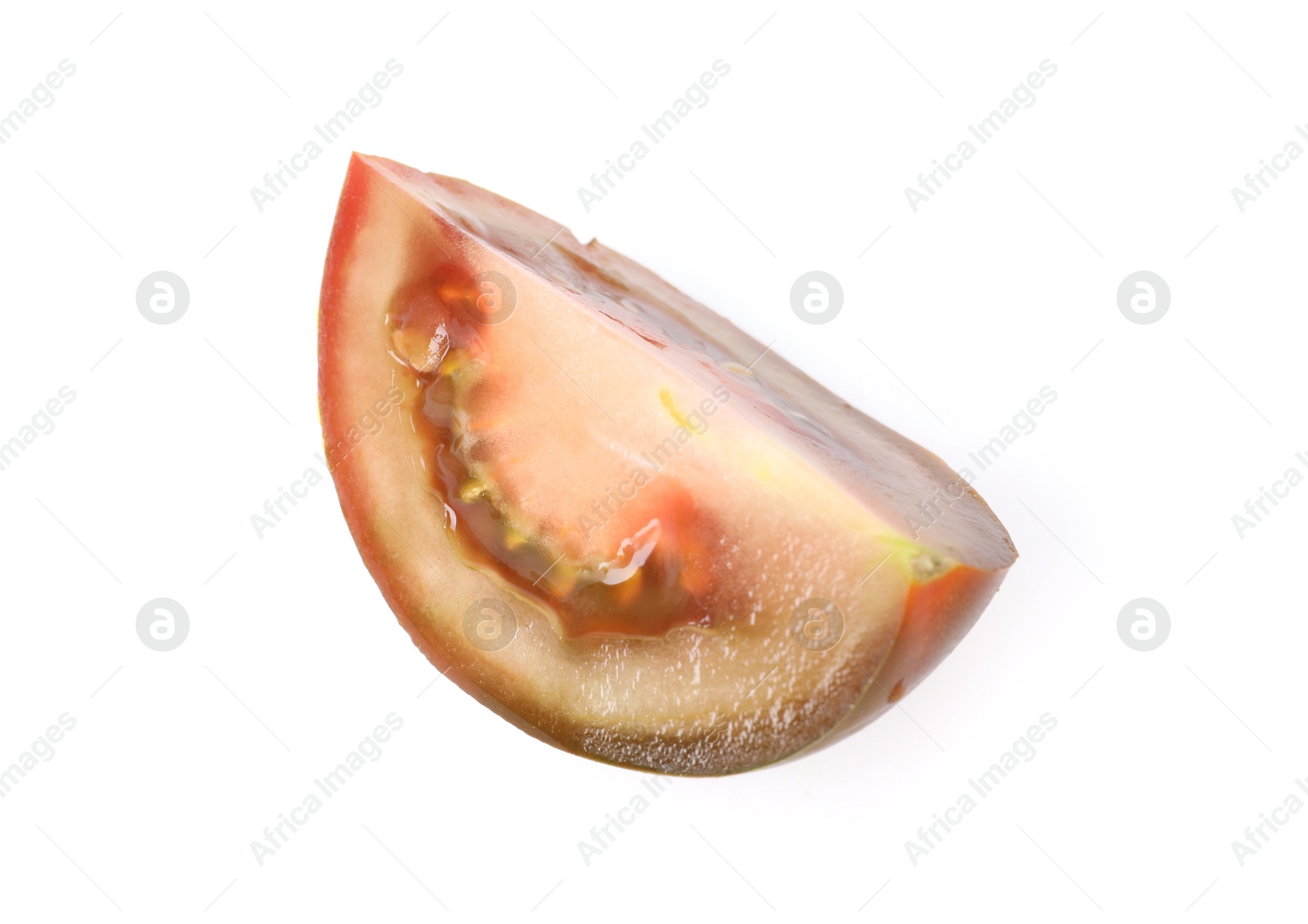 Piece of ripe tomato isolated on white Photo of Piece of ripe tomato isolated on white