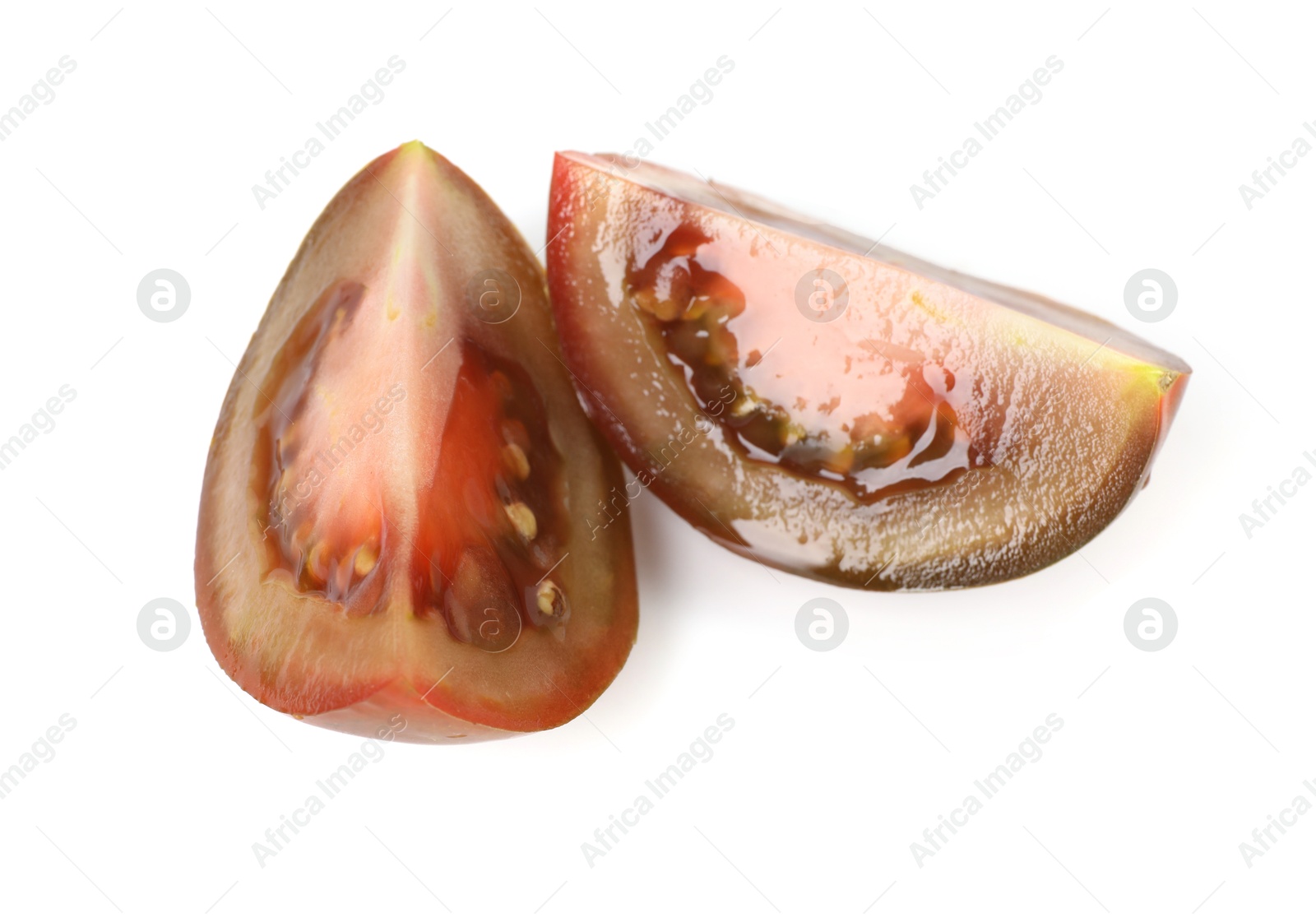 Photo of Pieces of ripe tomato isolated on white