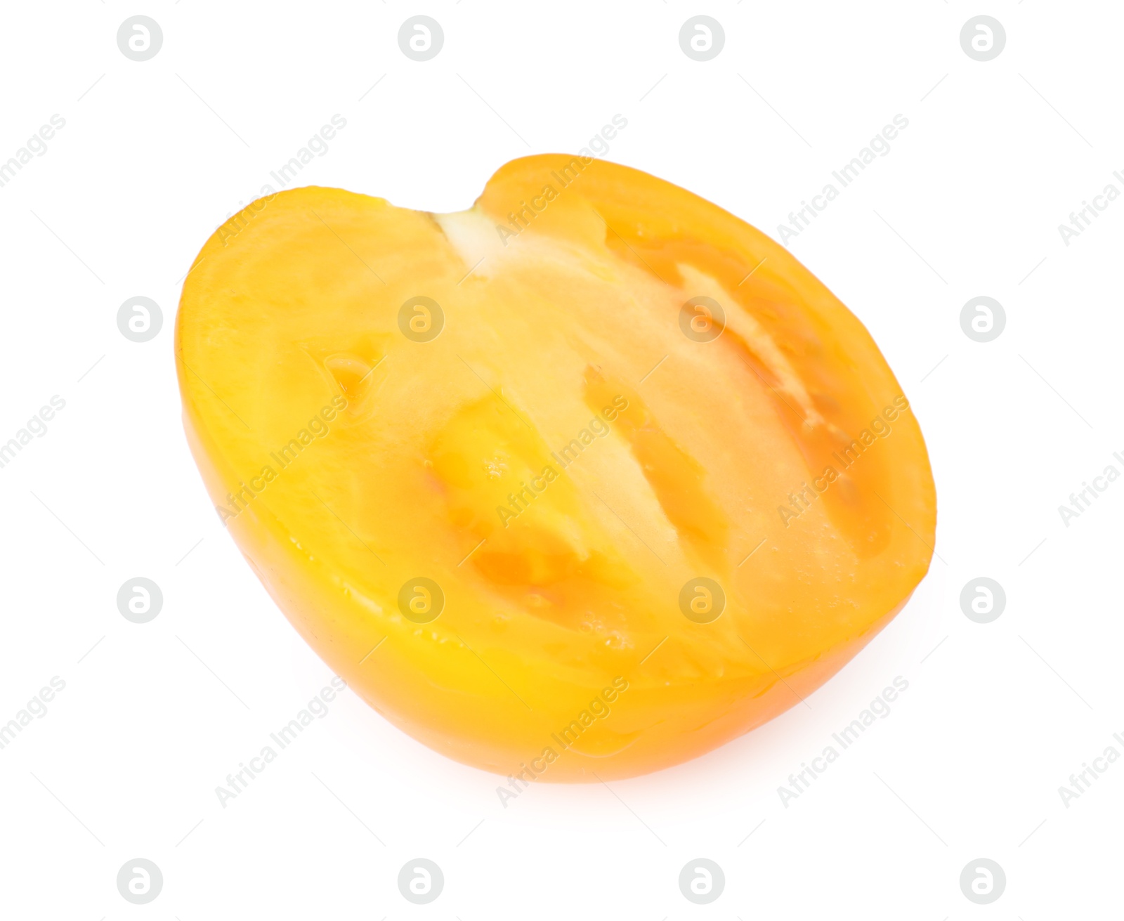 Piece of ripe yellow tomato isolated on white Photo of Piece of ripe yellow tomato isolated on white