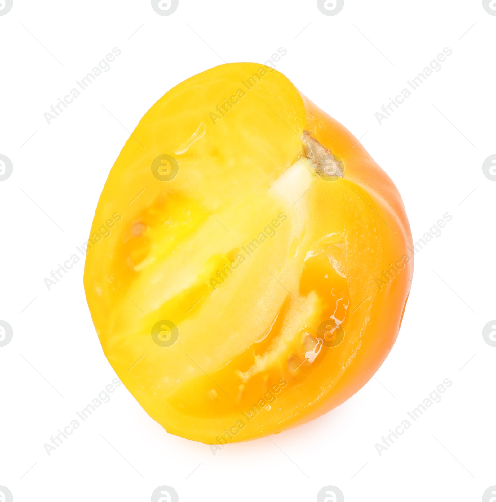 Piece of ripe yellow tomato isolated on white Photo of Piece of ripe yellow tomato isolated on white
