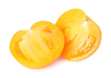 Photo of Pieces of ripe yellow tomato isolated on white