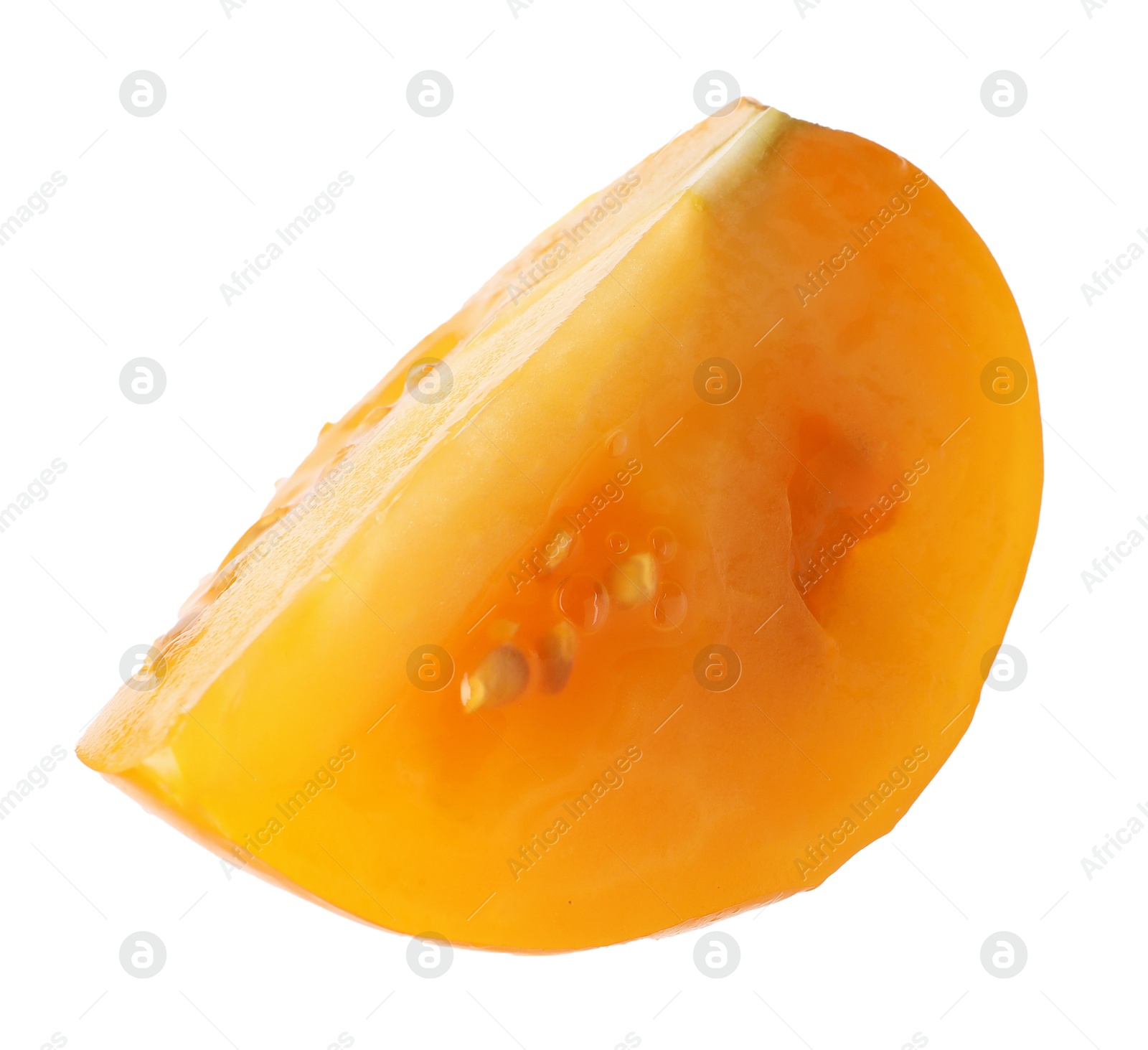 Piece of ripe yellow tomato isolated on white Photo of Piece of ripe yellow tomato isolated on white