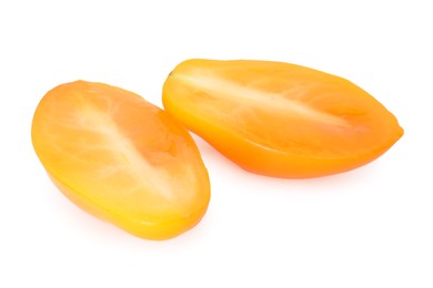 Photo of Pieces of ripe yellow tomato isolated on white