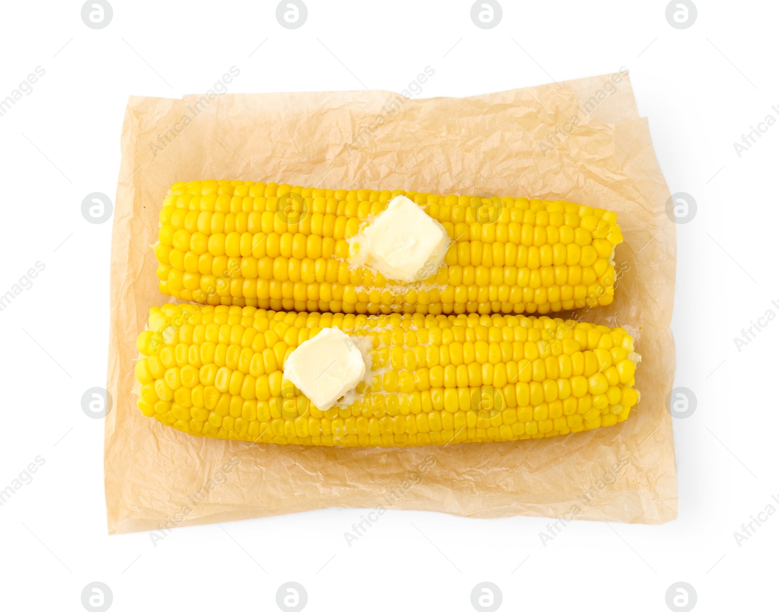 Photo of Tasty boiled corncobs with butter isolated on white, top view