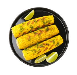 Photo of Tasty grilled corncobs with dill and lime slices isolated on white, top view